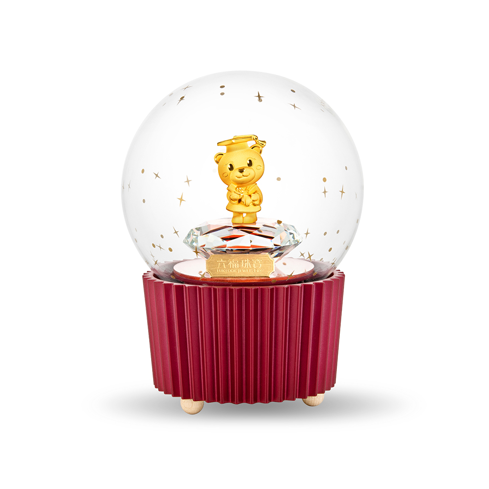"Graduate Bear” Gold Figurine in Crystal Ball Music Box